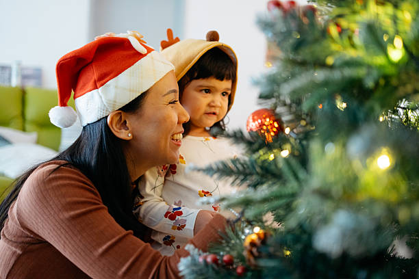 istock Festive Holiday Fun with Mother and Daughter 2245921723