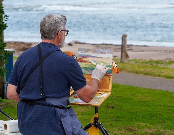 Maketu New Zealand - November 7 2025: Artists at setting and at work Maketu foreshore painting the view.
