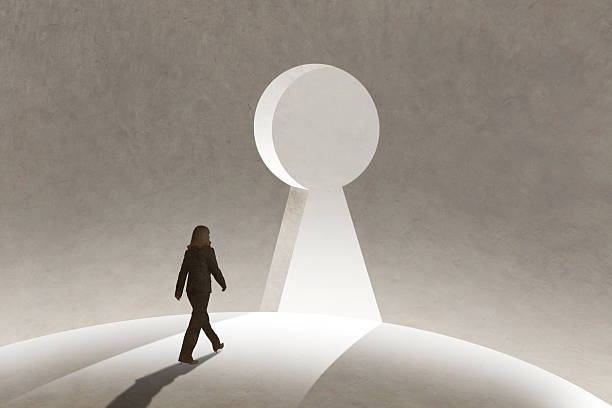 istock Woman Walks Toward Keyhole On The Horizon 2245925308