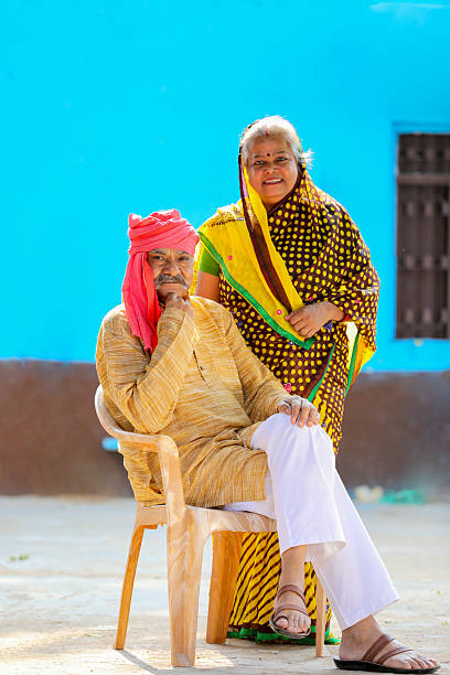 istock Indian rural couple giving expression at home 2245928317