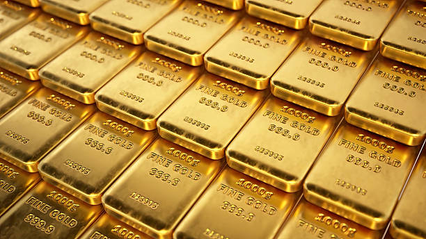 istock Large amounts of stack of gold ingots arranged in a row. 3D illustration 2245933162