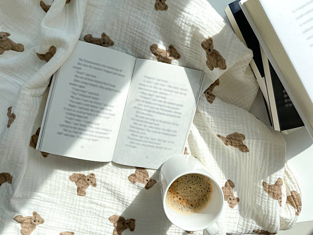istock Lazy Sunday Morning with Coffee and Books 2245936490