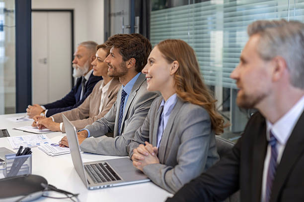 istock Row of business people working at seminar 2245942897