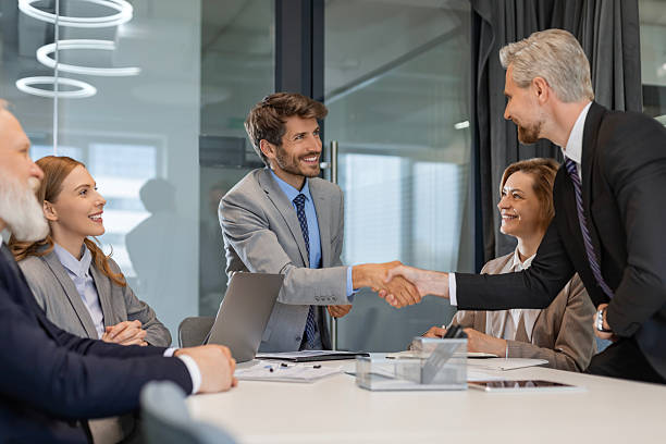 istock Businessmen shaking hands during a meeting. 2245943207