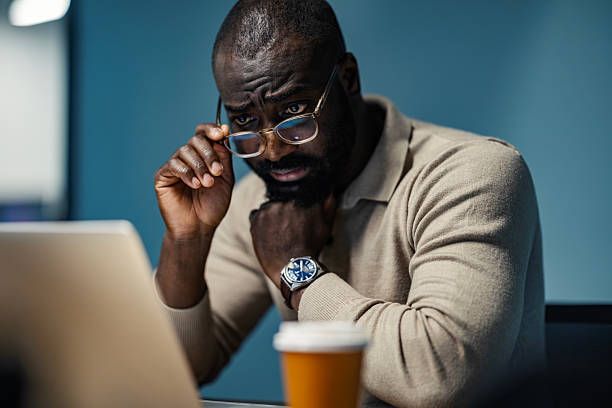 istock Businessman working focused late night at office 2245944900