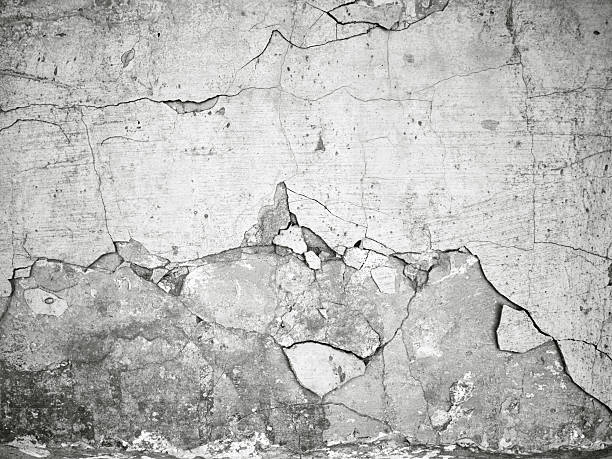 istock Gray white cracked concrete old grunge wall texture background 2245949215