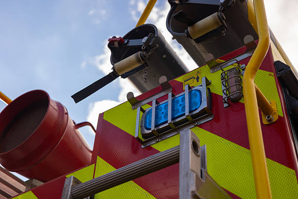 Fire engine and fire fighters at the scene of a fire in an apartment building in the city center of Zwolle.