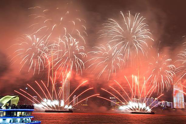 istock Vibrant fireworks over city skyline at night. 2245951417