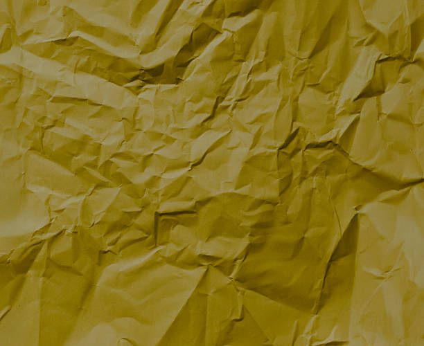 istock Yellow crumpled paper texture background. 2245951887