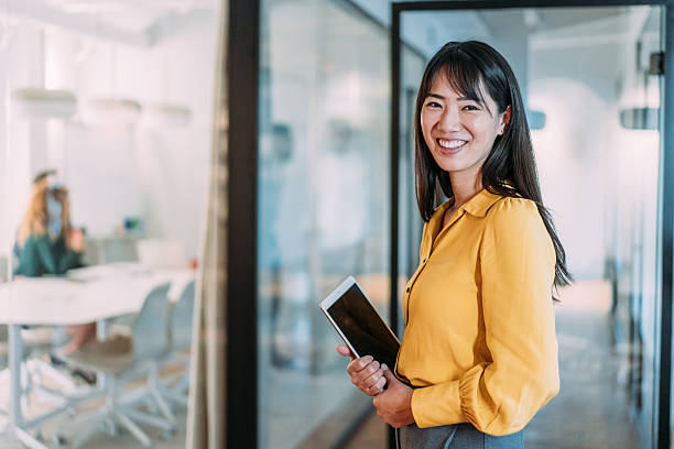 istock Successful businesswoman in the office. 2245953884