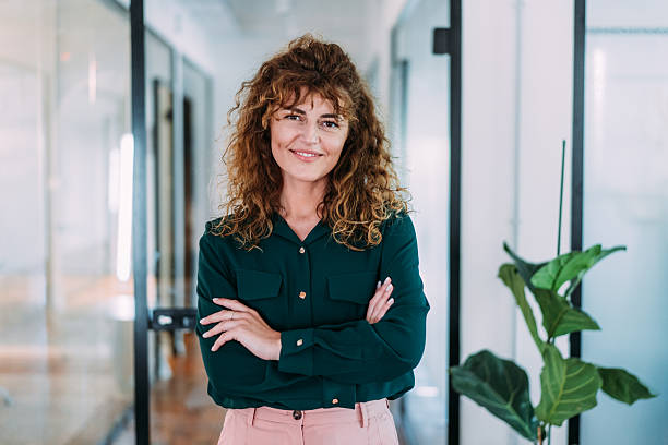 istock Confident businesswoman in modern office. 2245953911
