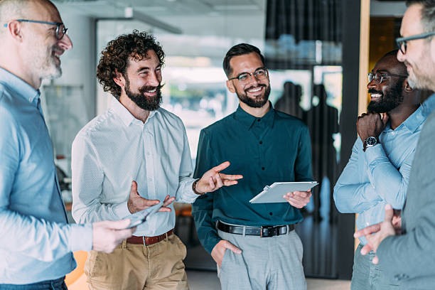 istock Successful male business team in the office. 2245956516
