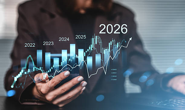 istock Businesswoman analyzing future financial growth graph with data projections leading to 2026 on transparent screen with rising trend concept. 2245959668