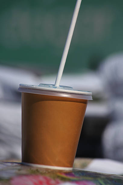 istock A take away coffee cup with a straw in it 2245962311