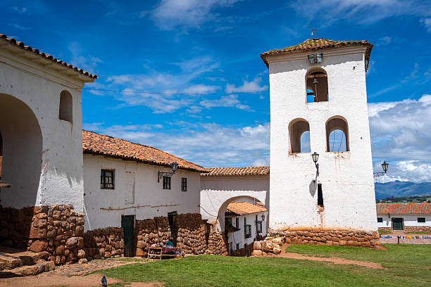 istock Colonial church in Chinchero, Peru, with white adobe bell tower 2245963086