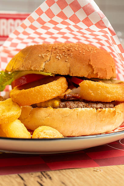 istock Hamburger sandwich, salad, chips, bacon and sauce 2245963606