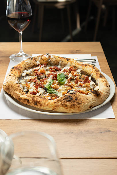 istock Pizza with mushrooms, truffle, cheese and bacon 2245965584