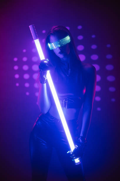istock Young Woman With Smart Glasses Holding A Neon Light 2245971190