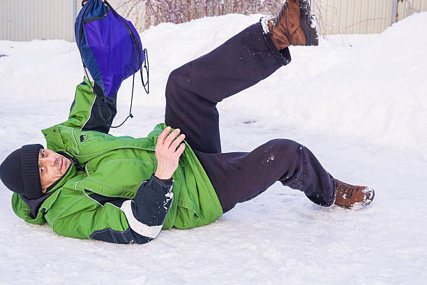 istock The man fell on slippery ice 2245972346