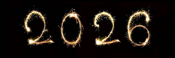 istock 2026 written with sparkler firework, new year holiday header or web banner 2245974763