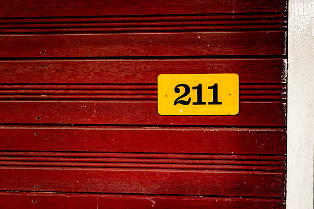 istock Number on a red wooden door 2245977067