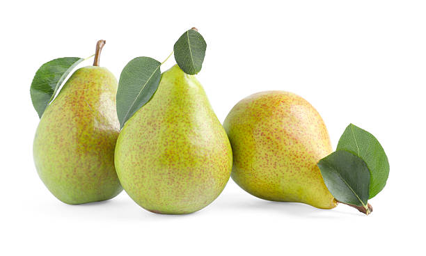 istock Fresh ripe pears with green leaves isolated on white 2245977139