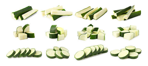 istock Cut fresh ripe zucchini isolated on white, collage 2245979404