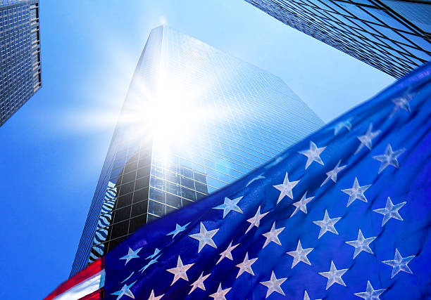 istock Skyscrapers with American flag in Manhattan 2245980958