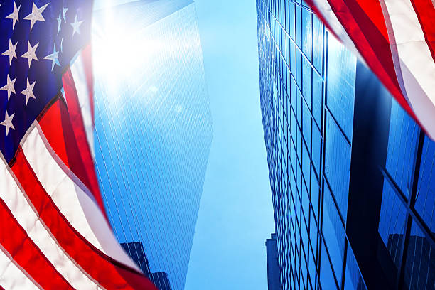 istock Skyscrapers with American flag in Manhattan 2245981327