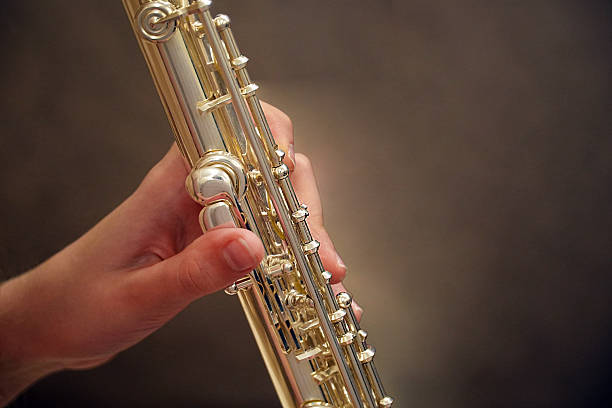 istock Close-up of flute in hand 2245981470