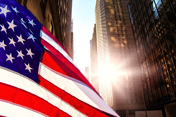 istock Skyscrapers with American flag in Manhattan 2245981655