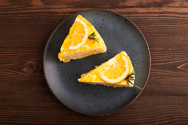 istock Lemon cake on brown wooden, top view, flat lay, close up 2245982212