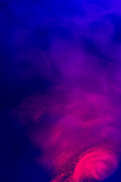 Abstract blue and purple smoke with neon glow creates a moody, dreamy atmosphere perfect for backgrounds, posters, or digital art. The soft gradient suggests mystery and ambiance.
