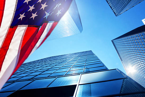 istock Skyscrapers with American flag in Manhattan 2245982492