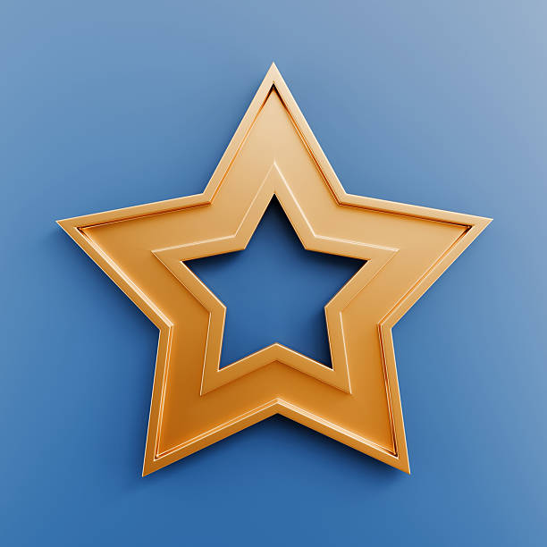 istock Yellow gold colored star shape on blue background 2245987416