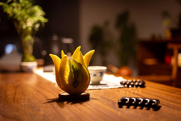 Buddha's hand and Chinese tea ceremony scene