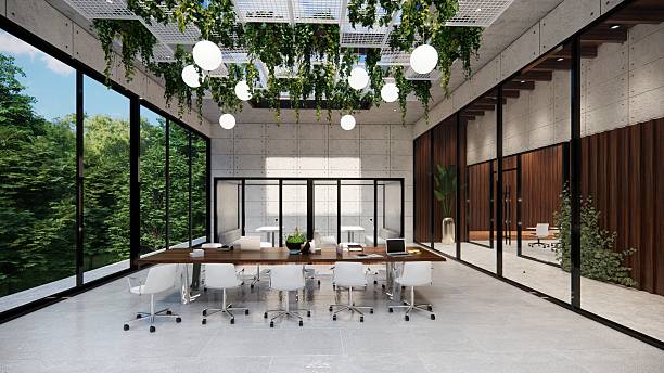 istock Modern Open Plan Office Space With Tables, Office Chairs, Creeper Plants And Manager Room. 2245990746