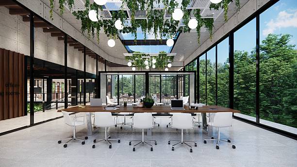 istock Modern Open Plan Office Space With Tables, Office Chairs, Creeper Plants And Manager Room. 2245990750