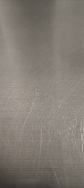 istock Used stainless steel sheet has scratches. 2245990784