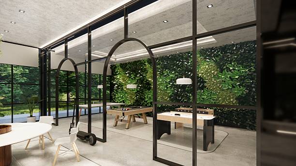 istock Modern Open Plan Office Space With Tables, Office Chairs, Creeper Plants And Manager Room. 2245990915