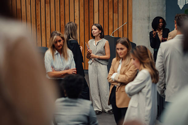 istock Women networking and discussing at professional conference event 2245991188