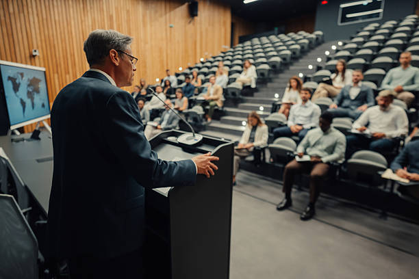 istock Speaker presenting a business strategy to audience in lecture hall 2245995689