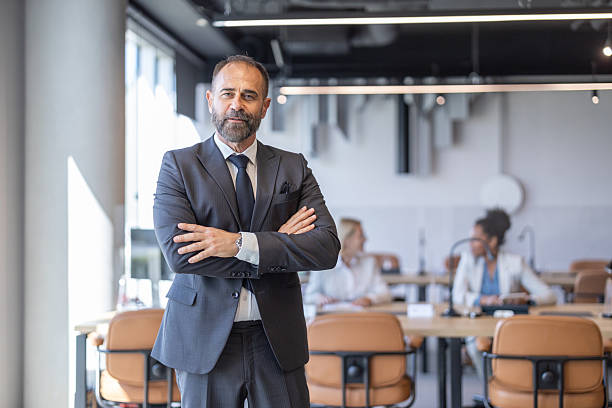 istock Confident Businessman Presenting Ideas in Modern Space 2245995899