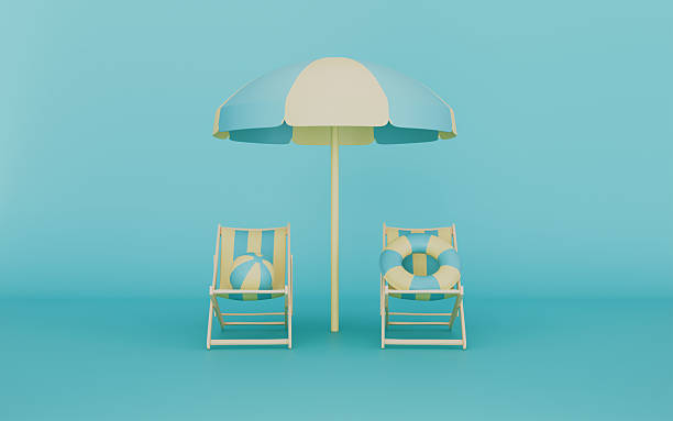 istock Beach umbrella with chairs and beach accessories, Summer vacation concept 2245997399