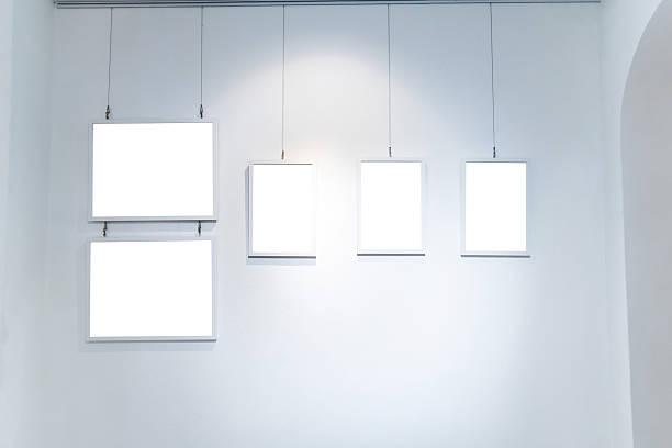 istock Blank picture frames hanging on the wall 2246005776