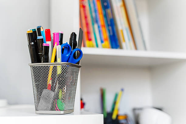 istock Desk organizer with colorful stationery in a bright study space. 2246008770