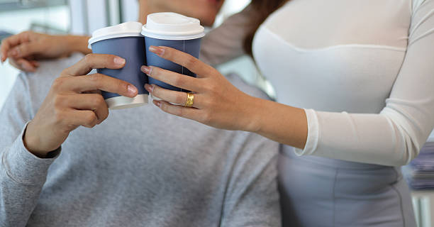istock Couple celebrating with coffee at home 2246010744