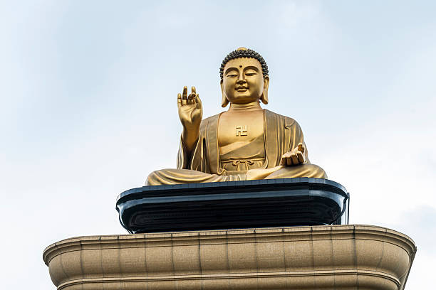istock The giant Buddha statues with a blue sky background. 2246013589