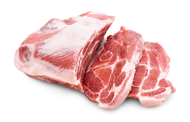istock A large raw pork shoulder cut with a thick fat cap and marbling, next to two thick, freshly sliced neck steaks, isolated on white. 2246014547