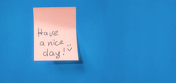 istock Simple sticky note with positive message on blue background brings cheer and encouragement 2246015959